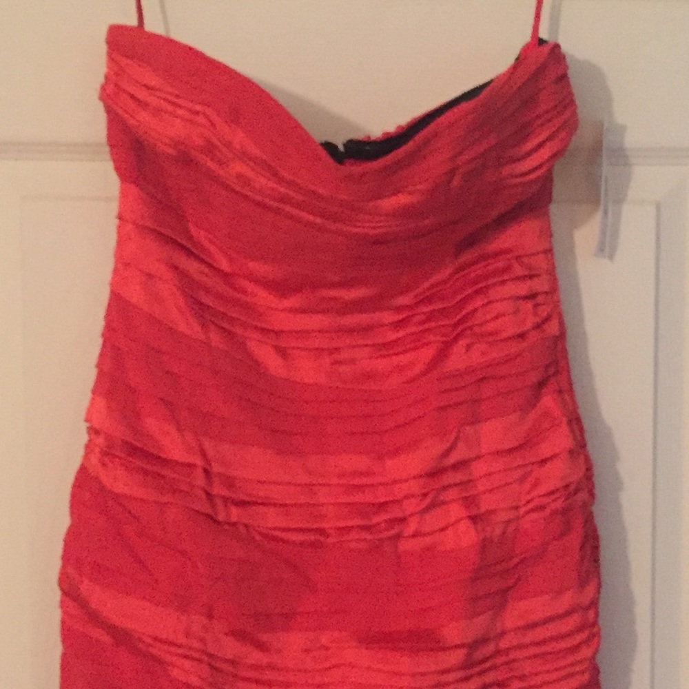 Red ruched mini body con dress
